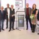 Bei der offiziellen Eröffnung der Route in Stadtallendorf: (v.li.): Dr. Jörg Probst (DIZ Stadtallendorf), Kreistagsvorsitzender Detlef Ruffert, Bürgermeister Christian Somogyi, Landrat Jens Womelsdorf, Prof. Dr. Christian Kleinschmidt (Philipps-Universität Marburg) sowie Anna Margarethe Becker und Dr. Markus Morr (beide Fachdienst Kultur und Sport des Kreises). (Foto: Landkreis Marburg-Biedenkopf/Regionalmanagement Mittelhessen/Manuel Heinrich)