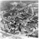 Die Limburger Südstadt: Die Luftaufnahme von 1957 macht deutlich, wie sich die Stadt jenseits der Bahnlinie gewandelt hat. Die Maschinenfabrik Scheid ist deutlich zu sehen, die Bebauung im Meilenstein steht am Beginn und vieles mehr. (Foto: Stadtarchiv Limburg)
